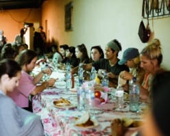 Large group of people eating at a restaurant